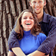 The couple share a moment of familial contentment.